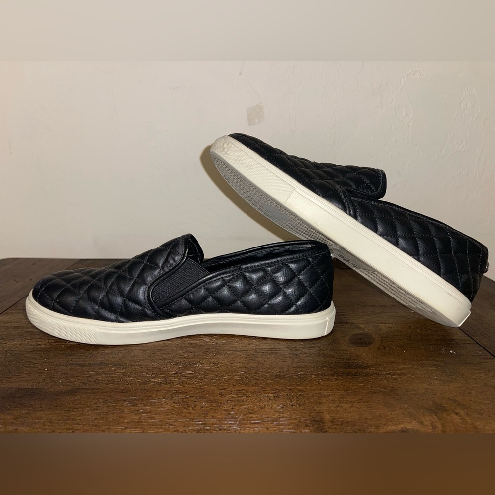 Black Quilted Steve Madden Slip ons